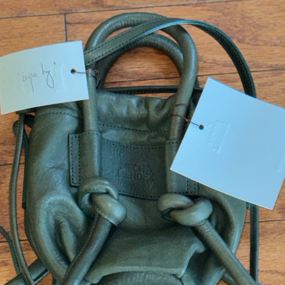 Mecha Mendez IRUPE Olive Leather Bag with Knot Accents. Selling Online for $360